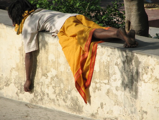 Man sleeping on wall
