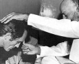 Osho Initiates Terence Stamp into Sannyas