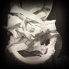 Toilet full of paper