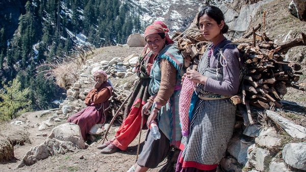 Village women carrying firewood