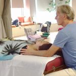 Chintan giving a craniosacral session