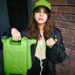 Woman with a can of gasoline