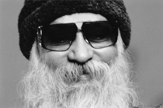 Osho with glasses