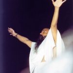 Osho conducting a meditation