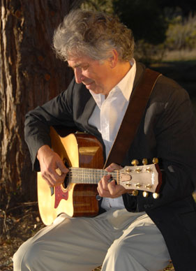 Peter Makena playing guitar