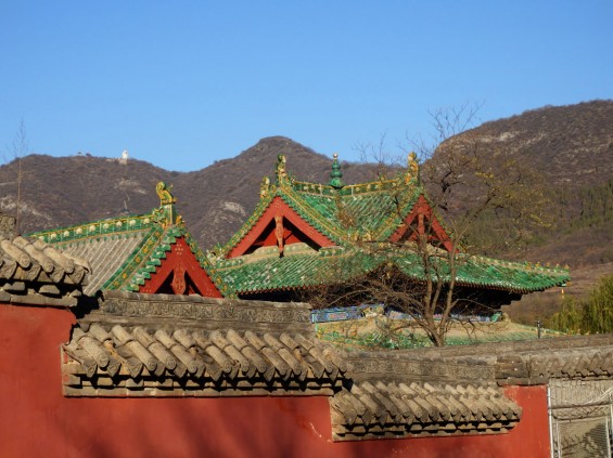 Roof of Shaolin Temple with Bodhidharma's cave and statue on Wuru Peak
