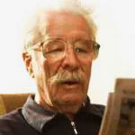 Man reading newspaper