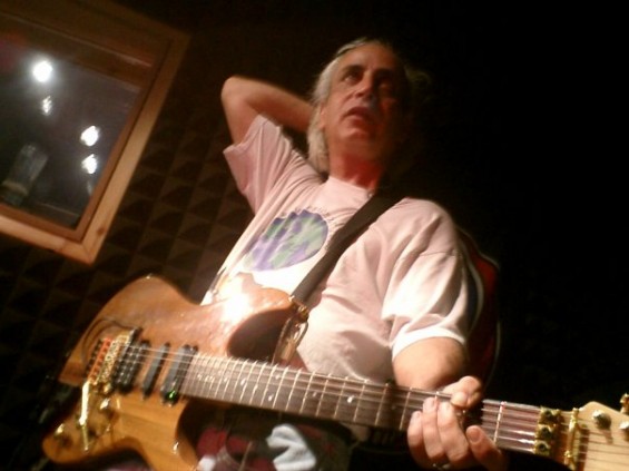 Prakash playing guitar 3