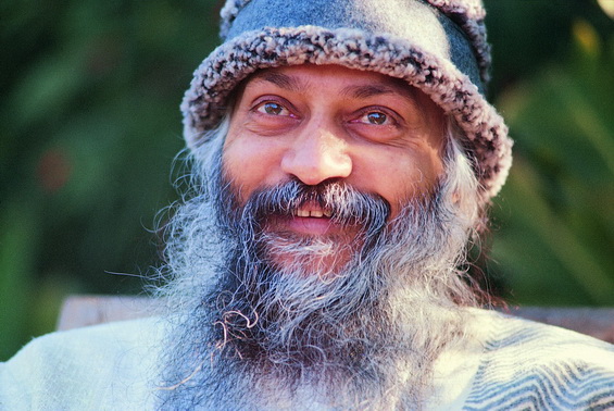 Osho laughing