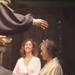 Osho sprinkling rose petals on Tamo-san