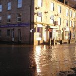 flood puddle in front of picture hhouse