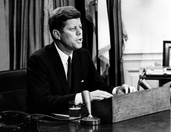 JFK at desk