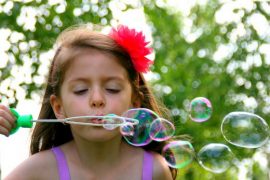 Child and soap bubbles