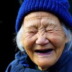 Old woman laughing