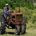 farmer-driving-traktor