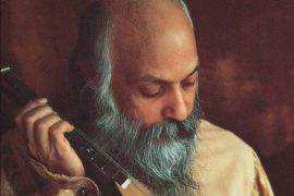 Osho with instrument