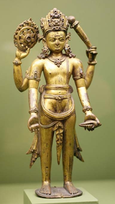A statue of Vishnu, with the Sudharshana Chakra in his upper right arm.