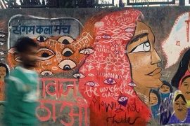 graffiti: woman with many eyes