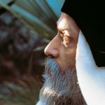 Osho in garden looking up