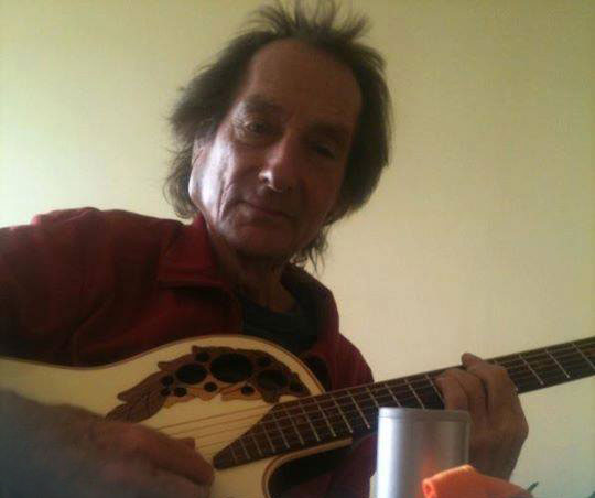 Avesh-playing-the-guitar