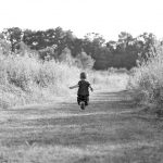Child running on path