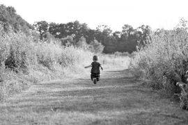 Child running on path