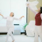 Nisarg and participant dancing