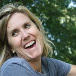 Laughing woman in garden