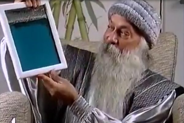 Osho holding picture