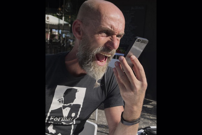 Man shouting into mobile
