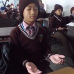 Children in Nepal meditating