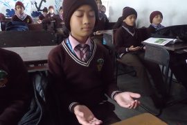 Children in Nepal meditating