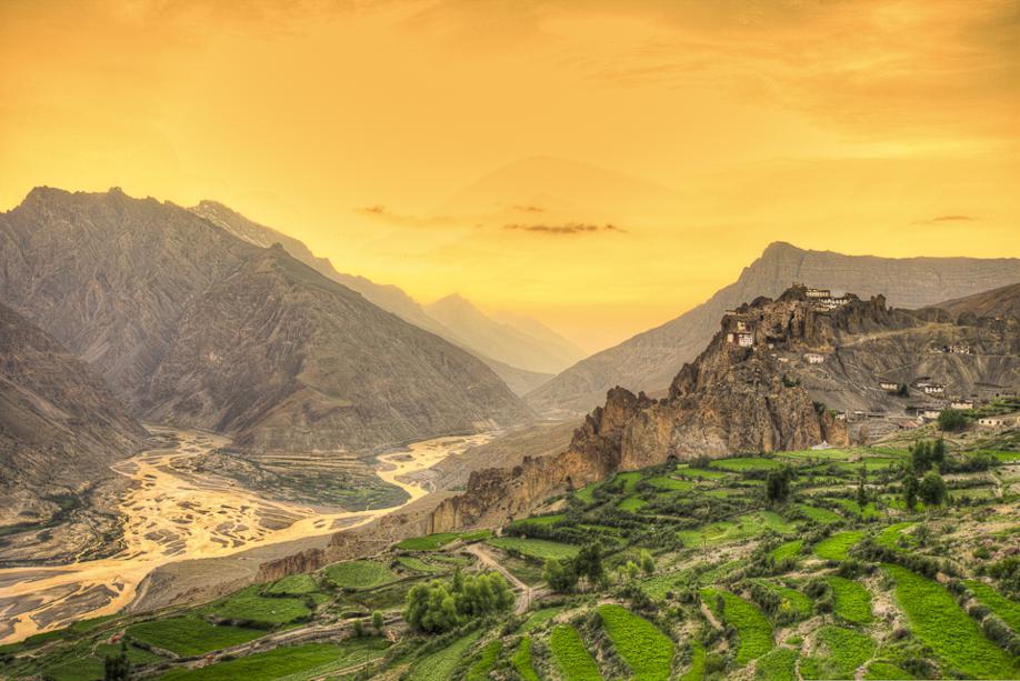 The Dankar Monastry sitting by the lush meadows and a glorious sunset