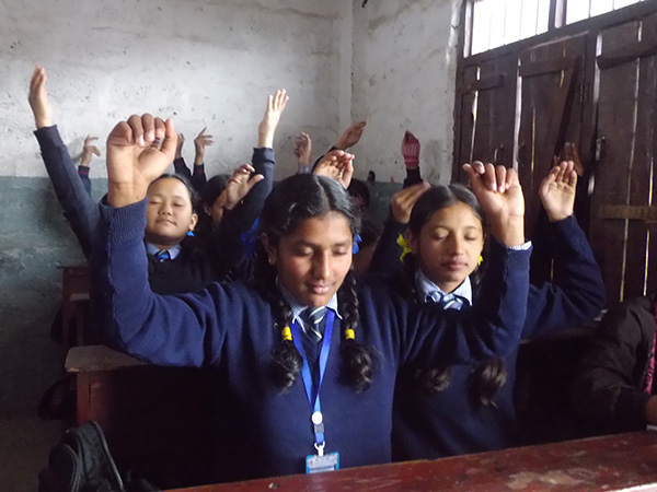 Children in Nepal meditating