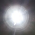 Policeman with flashlight