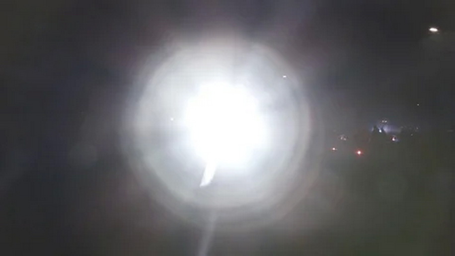 Policeman with flashlight
