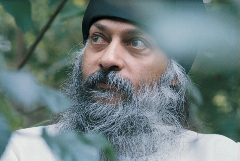 Osho with black hat