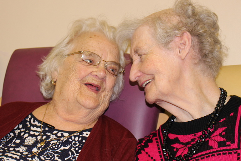 Two women chatting