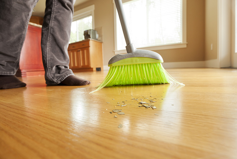 sweeping the floor