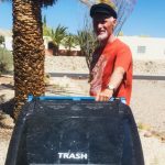 Srajan taking out trash