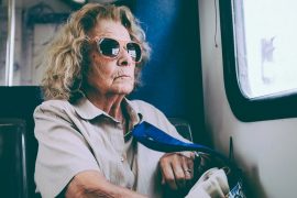 Elderly lady in bus