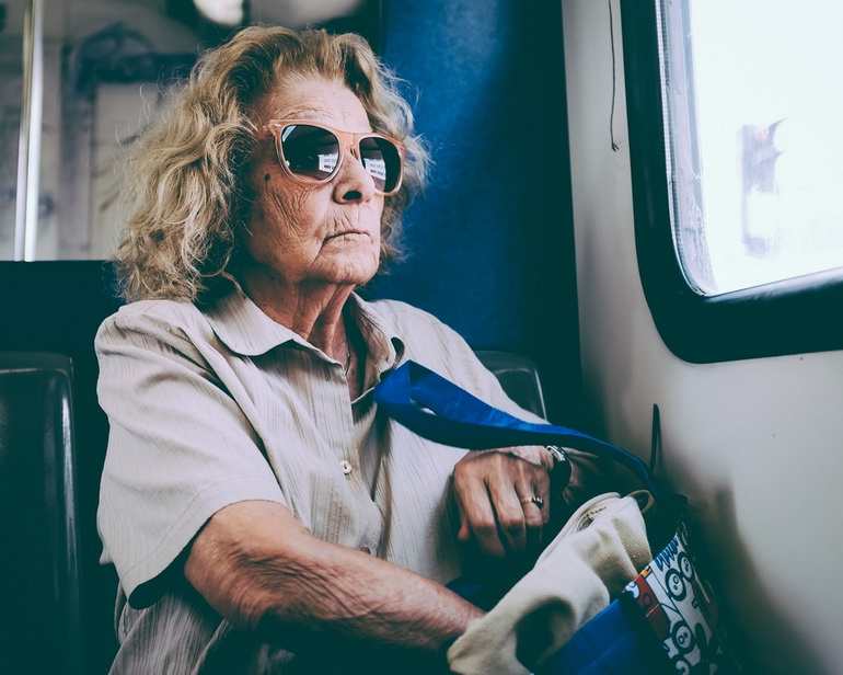 Elderly lady in bus