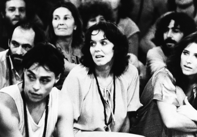 Devagyan (bottom left) at a centre meeting