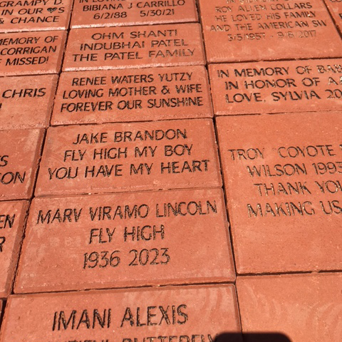 brick memorial for Viramo