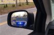 Blue lights in rearview mirror