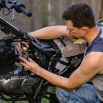 repairing motorcycle