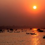 Boats crossing the river Buriganga