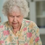 Woman with boy (detail)