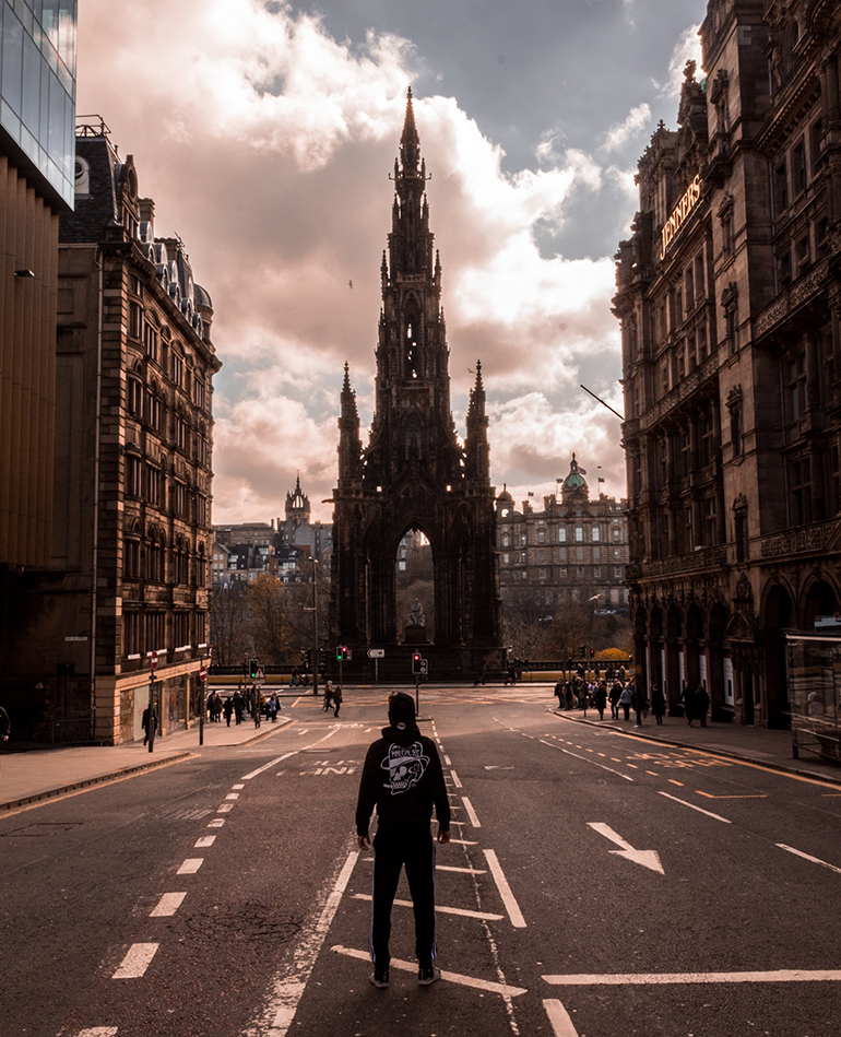Man standing in street in Edinburgh