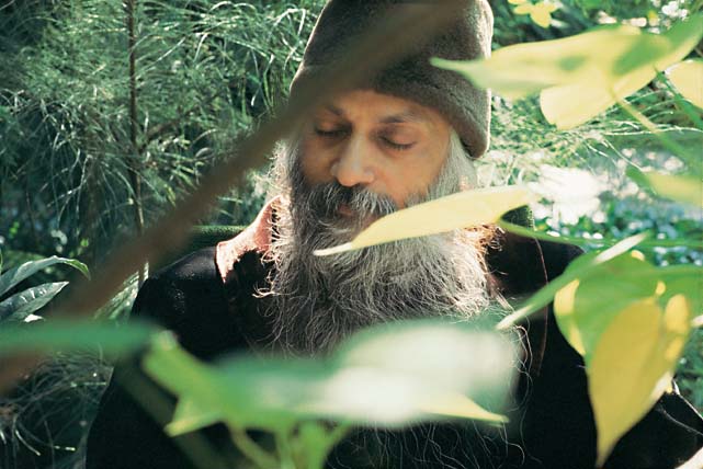 Osho with hat in garden